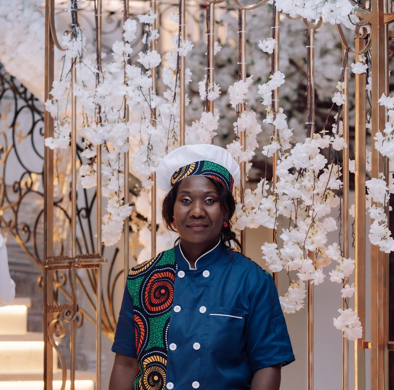 Syntia SAMBA, fondatrice d'ELICOOK LOD, en tenue de cuisine